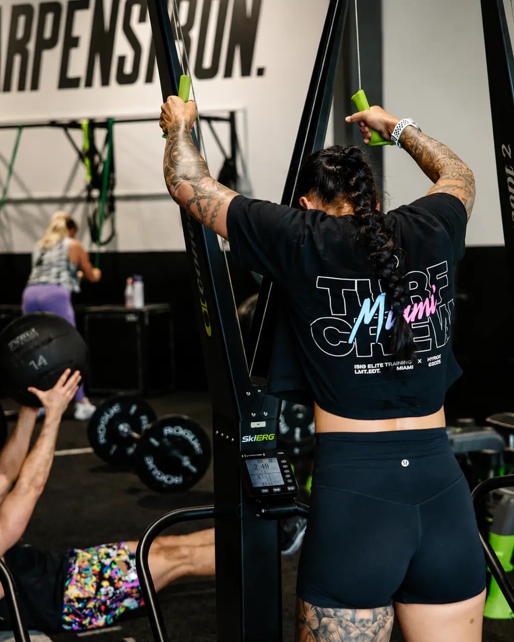 A member working the SkiErg during a session