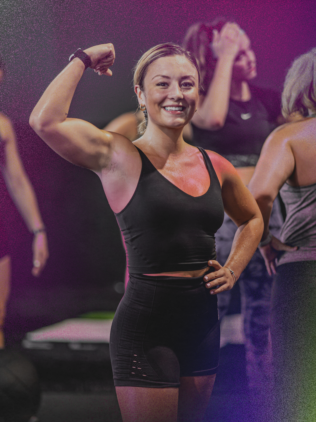 ISI Elite Training athlete flexing after a workout